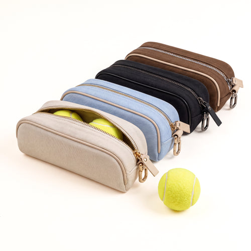 COVR ball pouches in several colourways with padel balls